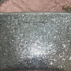 Adrienne Vittadini Studio Silver Glitter Wristlet with Cell phone Charging Cords